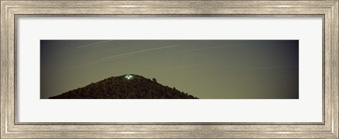 Framed Low angle view of star trails over a mountain peak, Echo Mountain, Piediluco Lake, Terni, Umbria, Italy Print