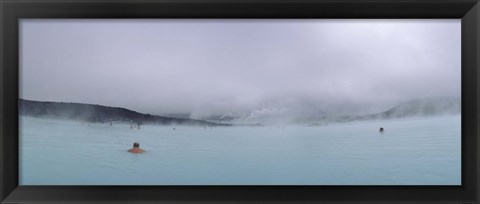 Framed Tourist swimming in a thermal pool, Blue Lagoon, Reykjanes Peninsula, Reykjavik, Iceland Print