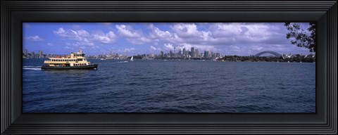 Framed Ferry in the sea with a bridge in the background, Sydney Harbor Bridge, Sydney Harbor, Sydney, New South Wales, Australia Print