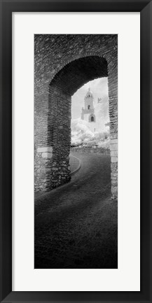 Framed Church viewed through an archway, Puerta Del Sol, Medina Sidonia, Cadiz, Andalusia, Spain Print