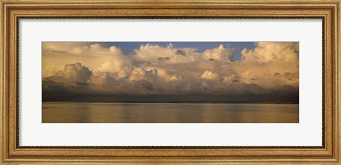 Framed Clouds over the sea Print