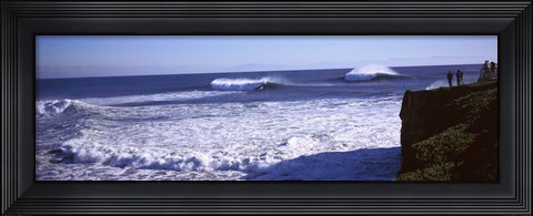 Framed Tourist looking at waves in the sea, Santa Cruz, Santa Cruz County, California, USA Print