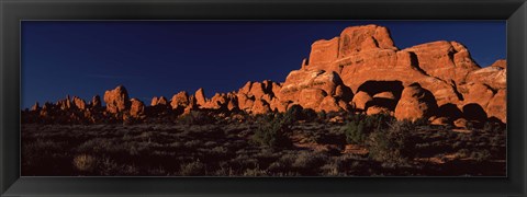 Framed Rock formations on an arid landscape, Arches National Park, Moab, Grand County, Utah, USA Print