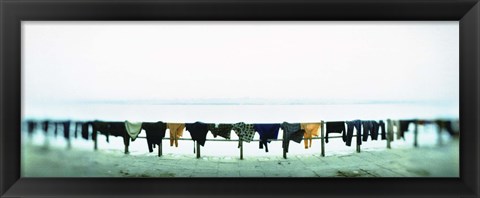 Framed Clothes drying at the riverbank, Ganges River, Varanasi, Uttar Pradesh, India Print