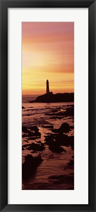 Framed Silhouette of a lighthouse at sunset, Pigeon Point Lighthouse, San Mateo County, California Print