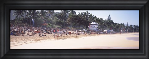 Framed Tourists on the beach, North Shore, Oahu, Hawaii, USA Print