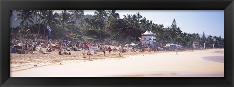 Framed Tourists on the beach, North Shore, Oahu, Hawaii, USA Print