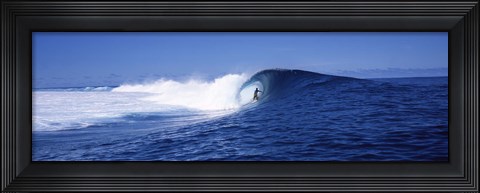 Framed Surfer in the sea, Tahiti, French Polynesia Print