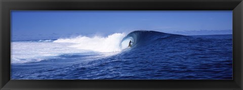 Framed Surfer in the sea, Tahiti, French Polynesia Print