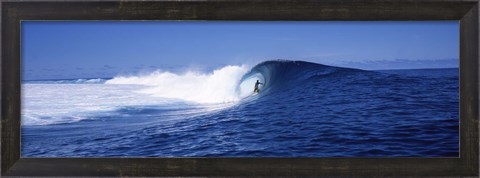 Framed Surfer in the sea, Tahiti, French Polynesia Print