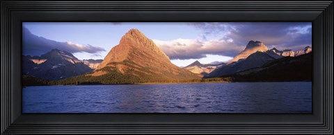 Framed Sunlight falling on mountains at the lakeside, Swiftcurrent Lake, Many Glacier, US Glacier National Park, Montana, USA Print