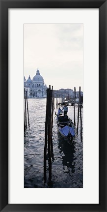 Framed Gondolier in a gondola with a cathedral in the background, Santa Maria Della Salute, Venice, Veneto, Italy Print