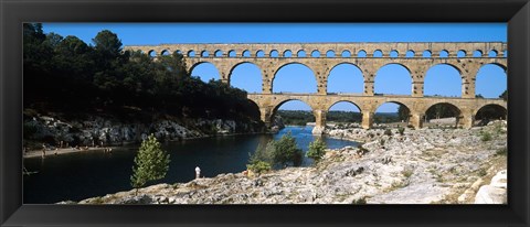 Framed Aqueduct across a river, Pont Du Gard, Nimes, Gard, Languedoc-Rousillon, France Print