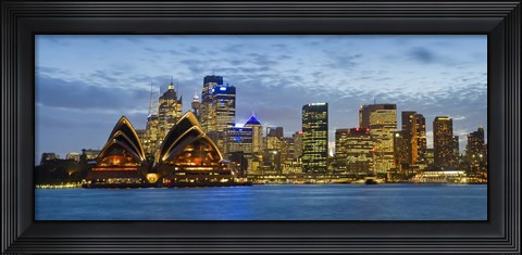 Framed Opera house and buildings lit up at dusk, Sydney Opera House, Sydney Harbor, Sydney, New South Wales, Australia Print