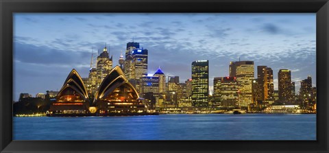 Framed Opera house and buildings lit up at dusk, Sydney Opera House, Sydney Harbor, Sydney, New South Wales, Australia Print