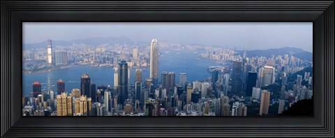 Framed Skyscrapers in a city, Victoria Harbour, Hong Kong, China Print