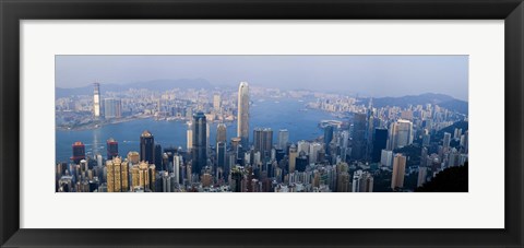Framed Skyscrapers in a city, Victoria Harbour, Hong Kong, China Print