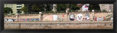 Framed Graffiti on a wall at the riverside, Wien River, Vienna, Austria Print