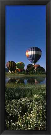 Framed Reflection of hot air balloons in a lake, Hot Air Balloon Rodeo, Steamboat Springs, Colorado, USA Print