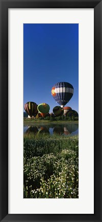 Framed Reflection of hot air balloons in a lake, Hot Air Balloon Rodeo, Steamboat Springs, Colorado, USA Print