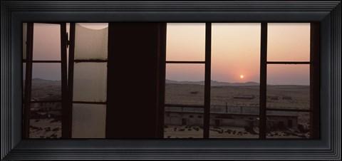 Framed Sunrise viewed through a window, Sperrgebiet, Kolmanskop, Namib Desert, Namibia Print