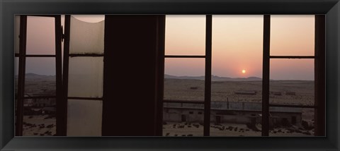 Framed Sunrise viewed through a window, Sperrgebiet, Kolmanskop, Namib Desert, Namibia Print