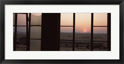 Framed Sunrise viewed through a window, Sperrgebiet, Kolmanskop, Namib Desert, Namibia Print