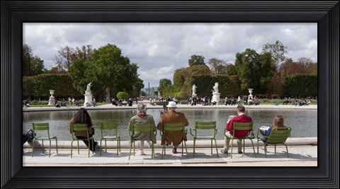 Framed Tourists sitting in chairs, Jardin de Tuileries, Paris, Ile-de-France, France Print