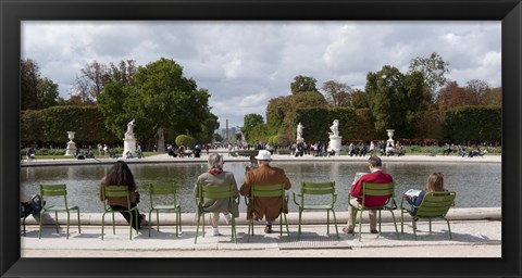 Framed Tourists sitting in chairs, Jardin de Tuileries, Paris, Ile-de-France, France Print