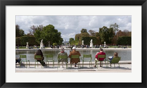 Framed Tourists sitting in chairs, Jardin de Tuileries, Paris, Ile-de-France, France Print