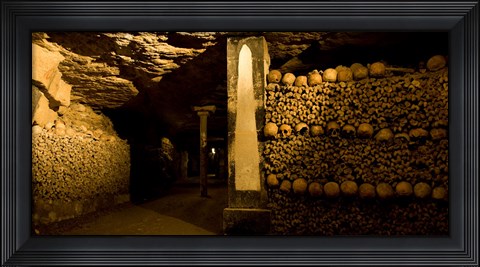 Framed Stacked bones in catacombs, Paris, Ile-de-France, France Print