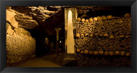 Framed Stacked bones in catacombs, Paris, Ile-de-France, France Print