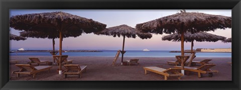 Framed Lounge chairs with sunshades on the beach, Hilton Resort, Hurghada, Egypt Print