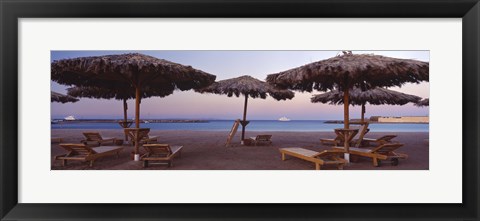 Framed Lounge chairs with sunshades on the beach, Hilton Resort, Hurghada, Egypt Print