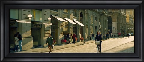 Framed Cyclists and pedestrians on a street, City Center, Florence, Tuscany, Italy Print
