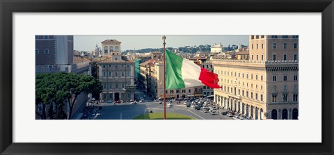 Framed Italian flag fluttering with city in the background, Piazza Venezia, Vittorio Emmanuel II Monument, Rome, Italy Print