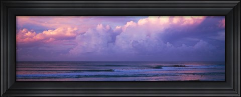 Framed Clouds over the sea at sunset Print