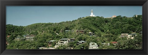 Framed Lighthouse on a hill Print