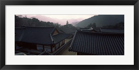 Framed Buddhist temple with mountain range in the background, Kayasan Mountains, Haeinsa Temple, Gyeongsang Province, South Korea Print