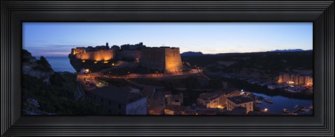 Framed Castle lit up at night, Bonifacio Harbour, Corsica, France Print