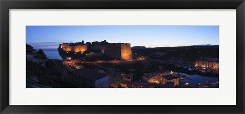 Framed Castle lit up at night, Bonifacio Harbour, Corsica, France Print