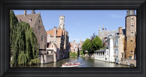 Framed Tourboat in a canal, Bruges, West Flanders, Belgium Print