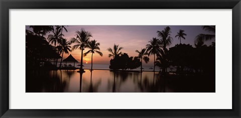 Framed Sunset over hotel pool, Lombok, West Nusa Tenggara, Indonesia Print