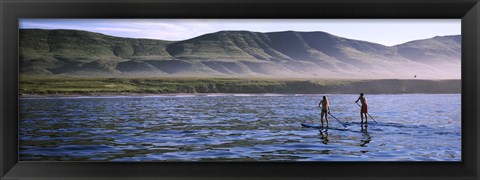 Framed Tourists paddleboarding in the pacific ocean, Santa Cruz Island, Santa Barbara County, California Print