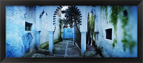Framed Painted wall of medina, Chefchaouen, Morocco Print
