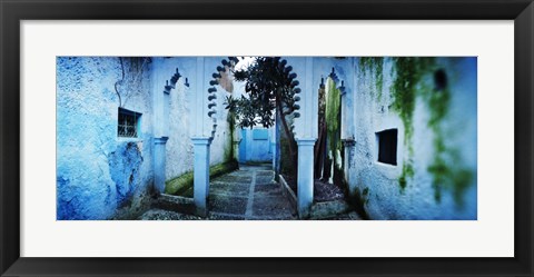 Framed Painted wall of medina, Chefchaouen, Morocco Print