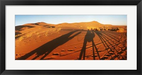 Framed Shadows of camel riders in the desert at sunset, Sahara Desert, Morocco Print