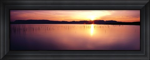 Framed Reflection of sun on water at dawn, Elephant Butte Lake, New Mexico, USA Print