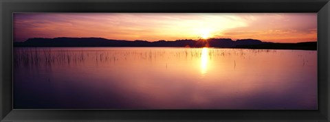 Framed Reflection of sun on water at dawn, Elephant Butte Lake, New Mexico, USA Print
