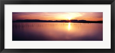 Framed Reflection of sun on water at dawn, Elephant Butte Lake, New Mexico, USA Print